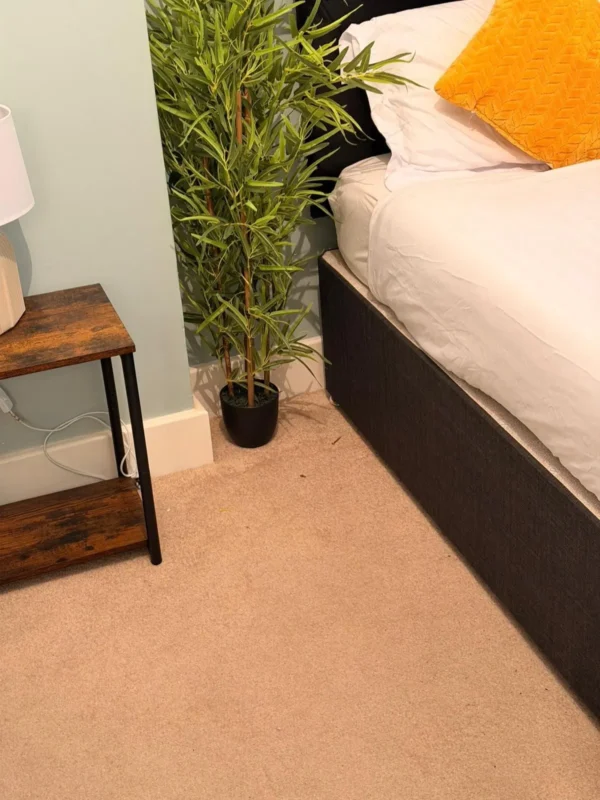Bedroom carpet vacuumed